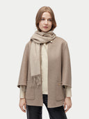 Unisex Organic Fringed Cashmere Woven Scarf Warm Grey worn by model, detail view on white background