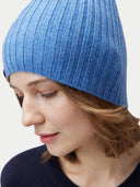 Unisex Cashmere Rib Knit Hat Blue worn by model, detail view on white background