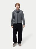 Unisex Cashmere Jersey Knit Scarf Dim Gray worn by model, front view on white background