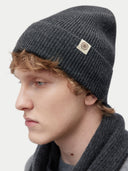 Unisex Cashmere Rib Knit Beanie Charcoal worn by model, detail view on white background
