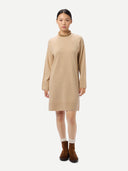 Women's Seamless Crewneck Cashmere Dress Beige worn by model front view on white background