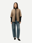 Women's Patch Pocket Cashmere Poncho Jacket Dark Navy worn by model detail view on white background