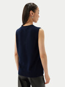 Women's Cashmere Crewneck Vest Navy   worn by model back view on white backround