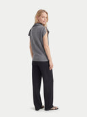 Women's Grey Cashmere Asymmetrical Top worn by model, back view on white background