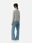 Women's Grey Cashmere Full-Zip Cardigan worn by model, back view on white background