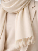 Organic Colour Cashmere Fringed Scarf Off White worn by model, detail view on white background