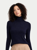 Timeless Cashmere Turtleneck Sweater Navy Blazer  worn by model, detail view, on white background