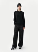 € 99 Cashmere Hat & Sweater Set Black worn by model, front view on white background