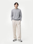 Men's high rise Cashmere Crewneck Sweater worn by model, front view on white background 