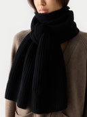 Wide Rib Knit Scarf Black  worn by model, detail view on white background