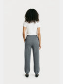 Women's Cashmere Sweatpants Plum Kitten worn by model, back view on white background