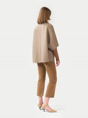 Women's Patch Pocket Cashmere Poncho Jacket Taupe worn by model back view on white background