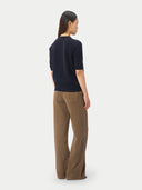 Women's Short-Sleeve Cashmere Sweater Navy worn by model, back view on white background