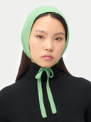 Green Cashmere Bonnet For Woman worn by model front view on white background
