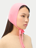 Pink Cashmere Bonnet For Woman worn by model side view on white background