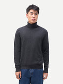 Men's Charcaol Turtleneck Cashmere Sweater worn by model, detail view on white background