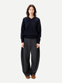 Barrel-Leg Cashmere Pants Charcoal  worn by model, detail view on white background