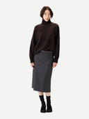 Unisex High-Neck Cashmere Sweater Mole worn by model, front view, on white background