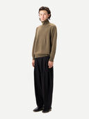 Unisex High-Neck Cashmere Sweater Aloe worn by model, front view, on white background