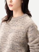 Unisex Mouline Cashmere Sweater Oxford Tan worn by model, detail view on white background