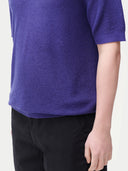 Men's Cashmere Silk Polo Skipper Blue worn by model, detail view on white background
