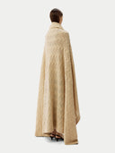Cashmere Blanket Taupe  worn by model, back view on white background