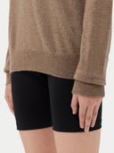Women's Taupe Crewneck Cashmere Sweater worn by model, detail view on white background