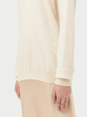 Women's White Cashmere Basic Crew Neck Sweater  worn by model, detail view on white background
