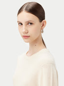 Women's White Cashmere Basic Crew Neck Sweater  worn by model, detail view on white background

