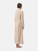Women's Organic Colour Long Cashmere Robe Beige worn by model, back view on white background
