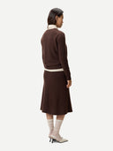Women's Deep Mahogany  A-Line Cashmere Knitted Skirt worn by model, back view on white background