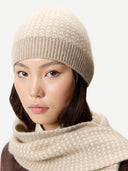Waffle Knit Cashmere Hat Warm Grey worn by model detail view on white background