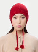 Ultimate Warmth Knit Tie Hat Chili Pepper   worn by model, front view on white background
