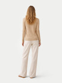 Women's Beige Cashmere  V-Neck  Cardigan  worn by model, back view on white background