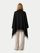 Cashmere Large Blanket with Fringe Black   worn by model, back view on white background
