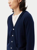 Men's Navy Cashmere Polo Sweater  worn by model, side view on white background