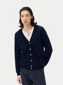 Men's Navy Cashmere Polo Sweater  worn by model, detail view on white background