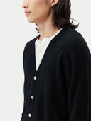 Men's Black Cashmere Polo Sweater  worn by model, detail view on white background