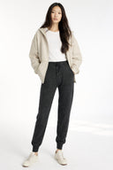 Women's Cashmere Cuffed Jogger Charcoal worn by model, front view on white background