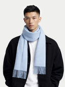 Cashmere Fringed Scarf Light Blue worn by model, detail view on white background
