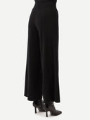 Women's Wide-Leg Cashmere Pants Black worn by model, side view on white background