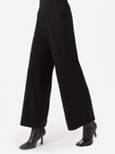 Women's Wide-Leg Cashmere Pants Black worn by model, side view on white background