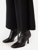 Women's Wide-Leg Cashmere Pants Black worn by model, detail view on white background