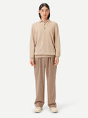 Men's Beige Cashmere Polo Sweater  worn by model, front view on white background