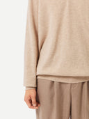 Men's Beige Cashmere Polo Sweater  worn by model, detail view on white background