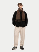 Cashmere Fringed Scarf Cocoa  worn by model, detail view on white background
