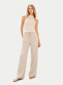 Women's Organic Cashmere Turtleneck Top Off White worn by model front view on white backround