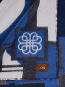 Close-up of a patterned fabric with a logo and 'Gobi' branding.