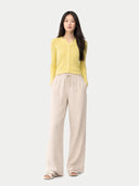 Women's Hidden Button-Front Cashmere Silk Cardigan Yellow  worn by model, front view on white background