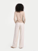 Women's Beige Cashmere Full-Zip Cardigan worn by model, back view on white background
